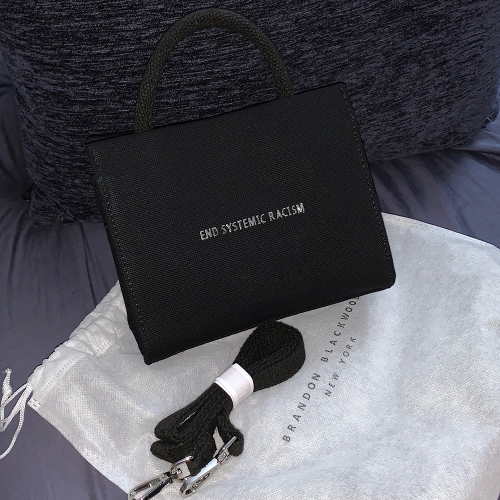 Brandon Blackwood black canvas ESR tote.